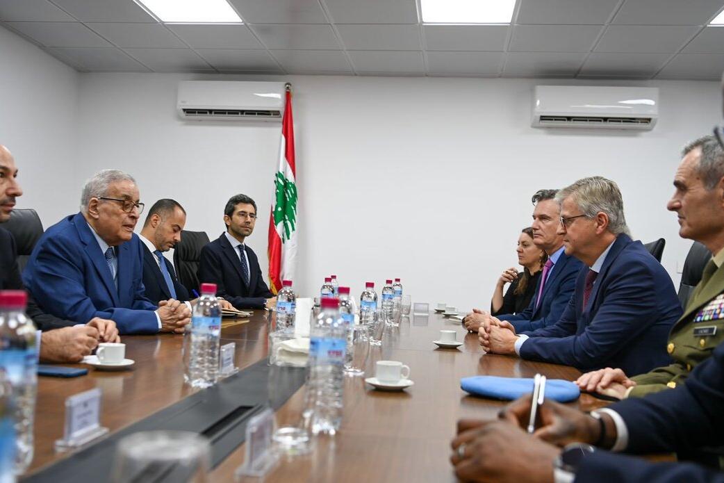 Jean-Pierre Lacroix speaks with representatives at a conference table.